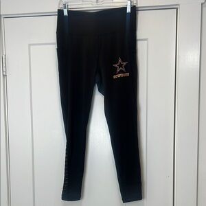 NFL Black Leggings with Cowboys Star size medium. In excellent condition!